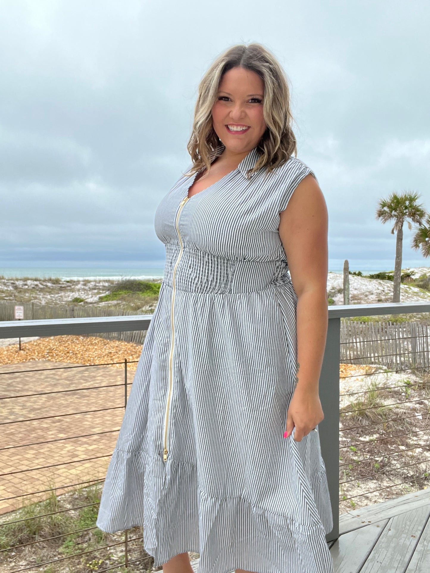 "Momentum" Sleeveless Zip Front Striped Dress