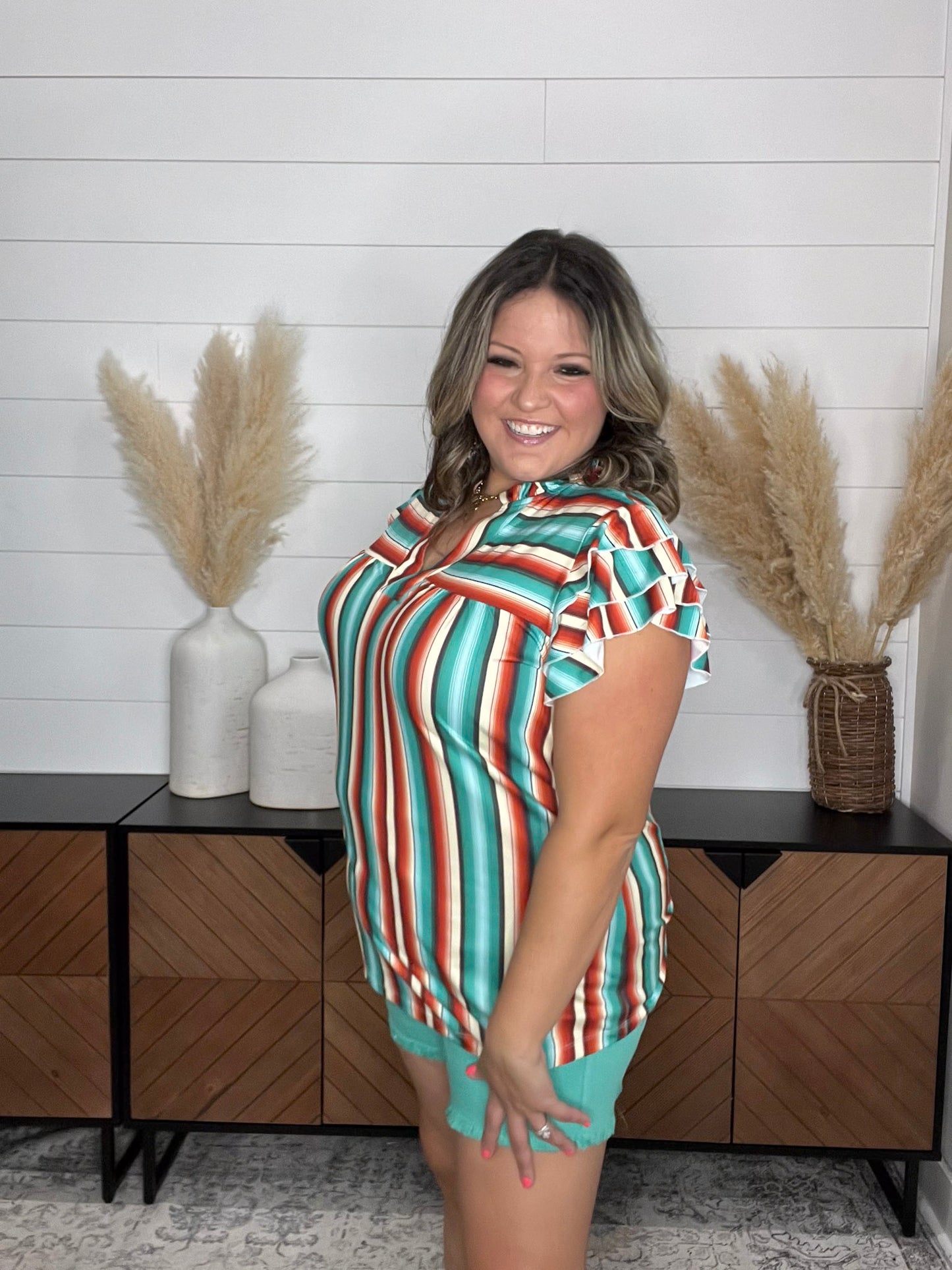 "Sundowner" V Neck with Ruffle Sleeve