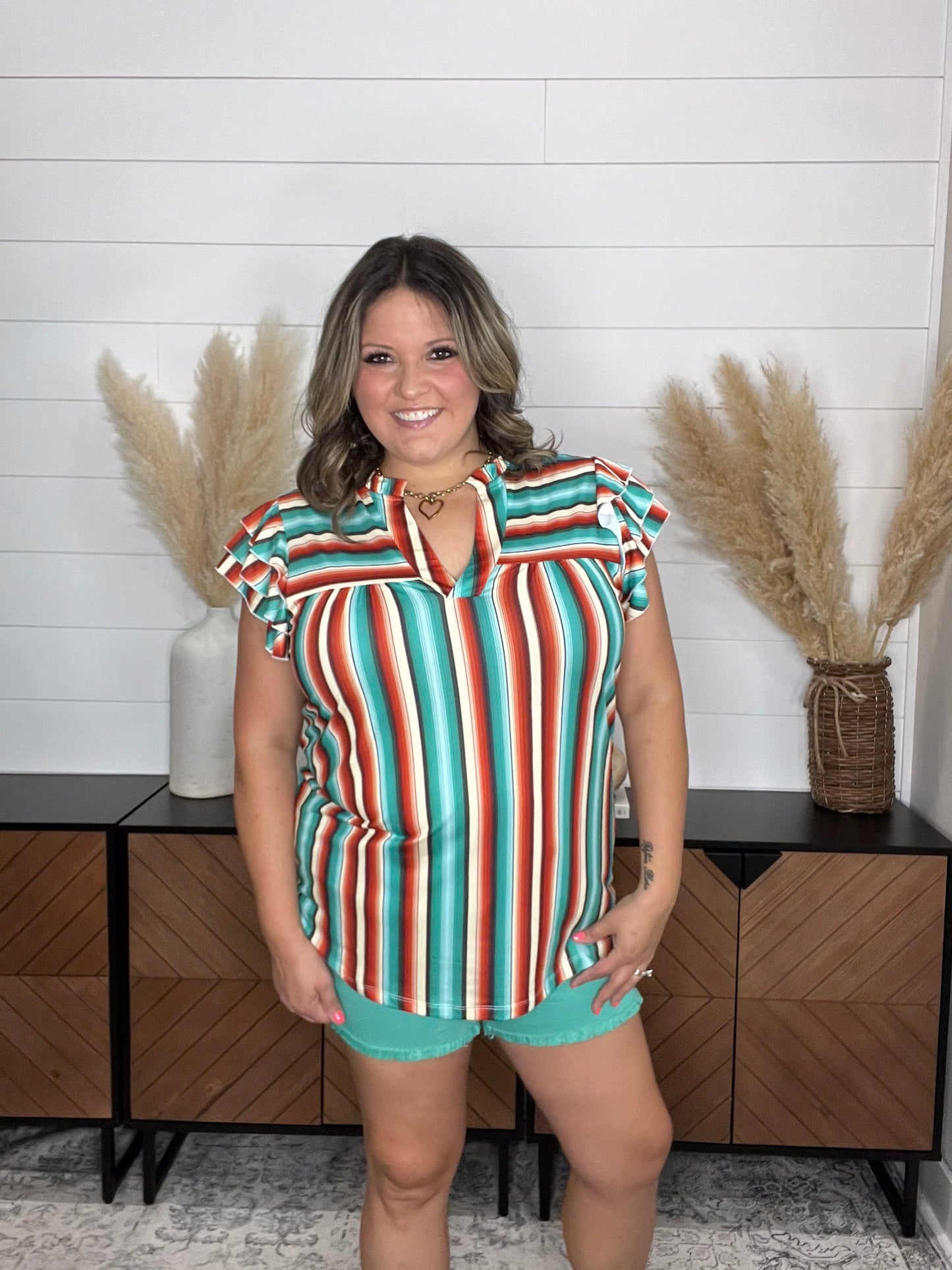 "Sundowner" V Neck with Ruffle Sleeve