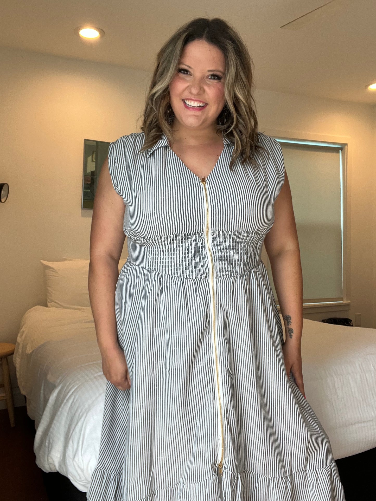 "Momentum" Sleeveless Zip Front Striped Dress