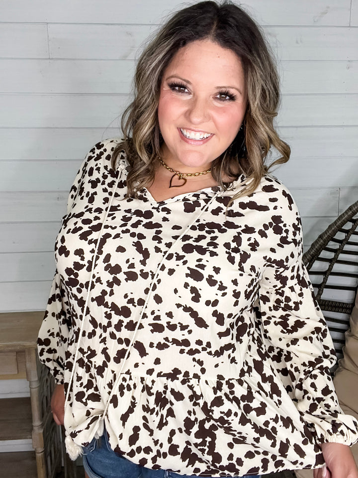 "Pasture" Animal Print Bubble Long Sleeve Peplum Top