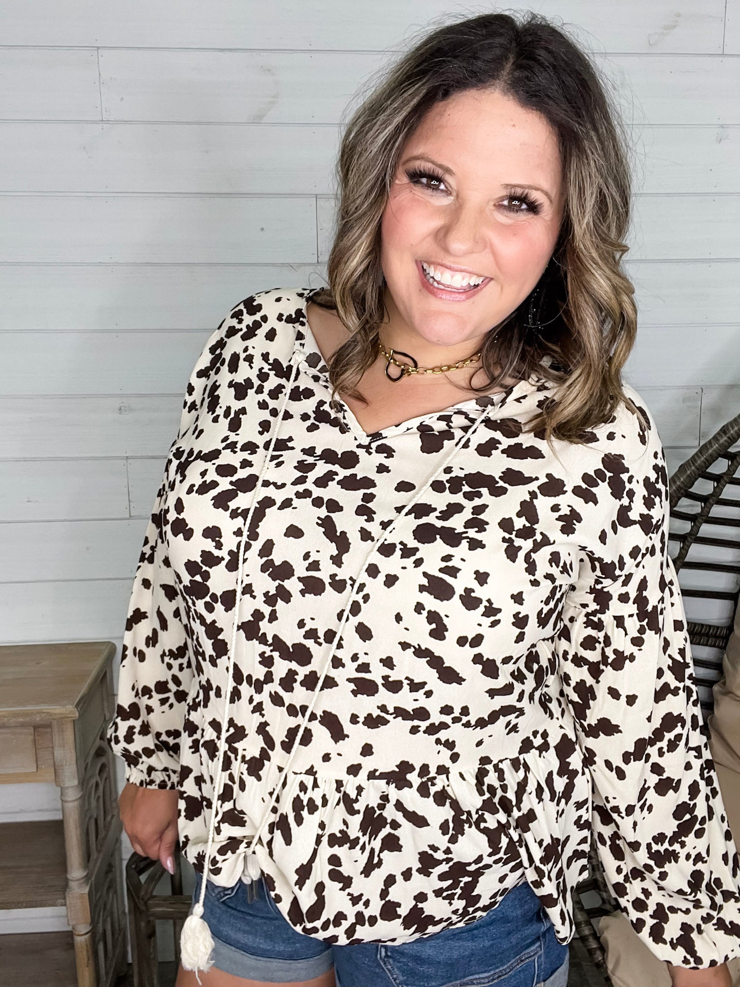 "Pasture" Animal Print Bubble Long Sleeve Peplum Top
