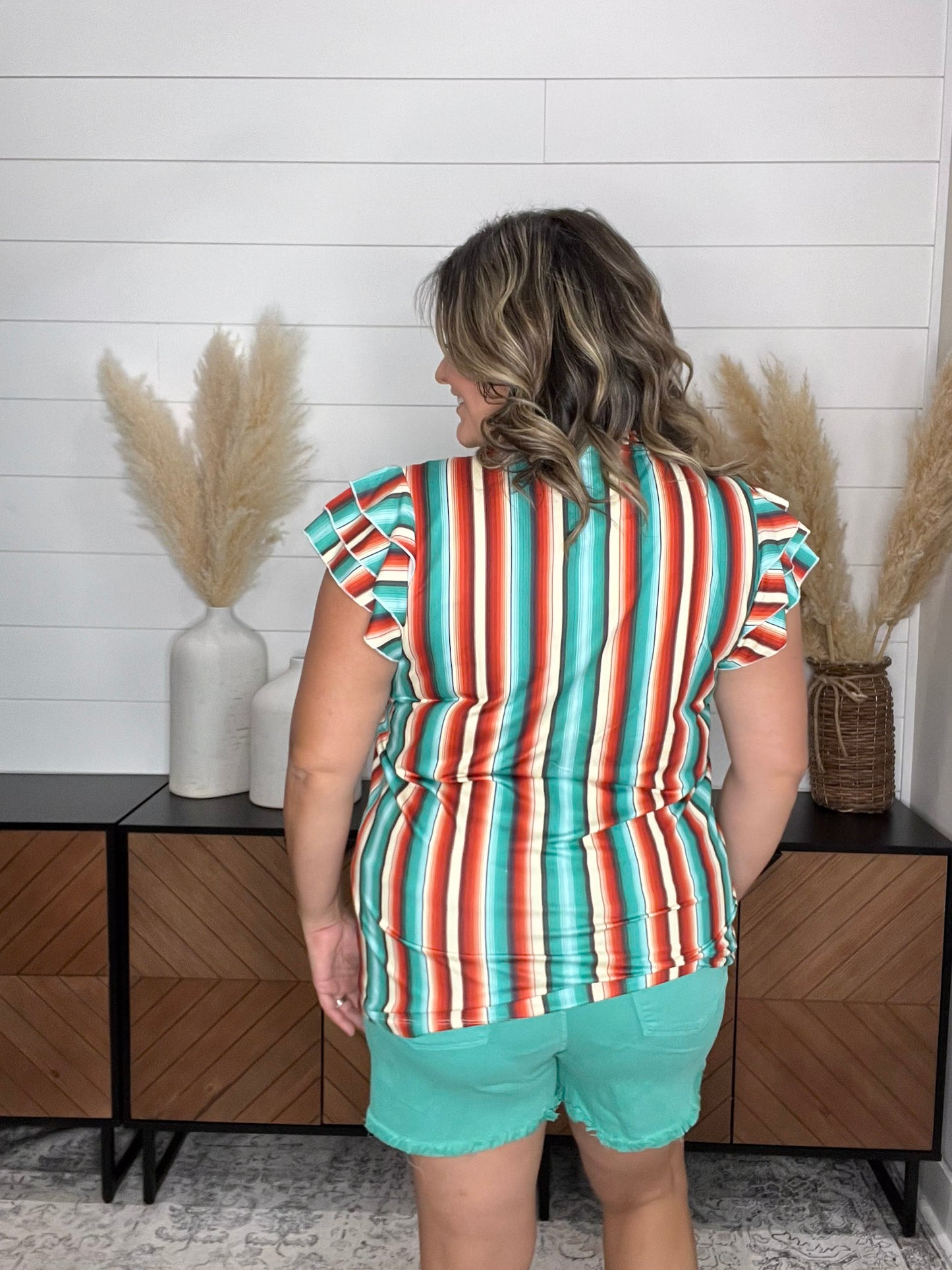 "Sundowner" V Neck with Ruffle Sleeve