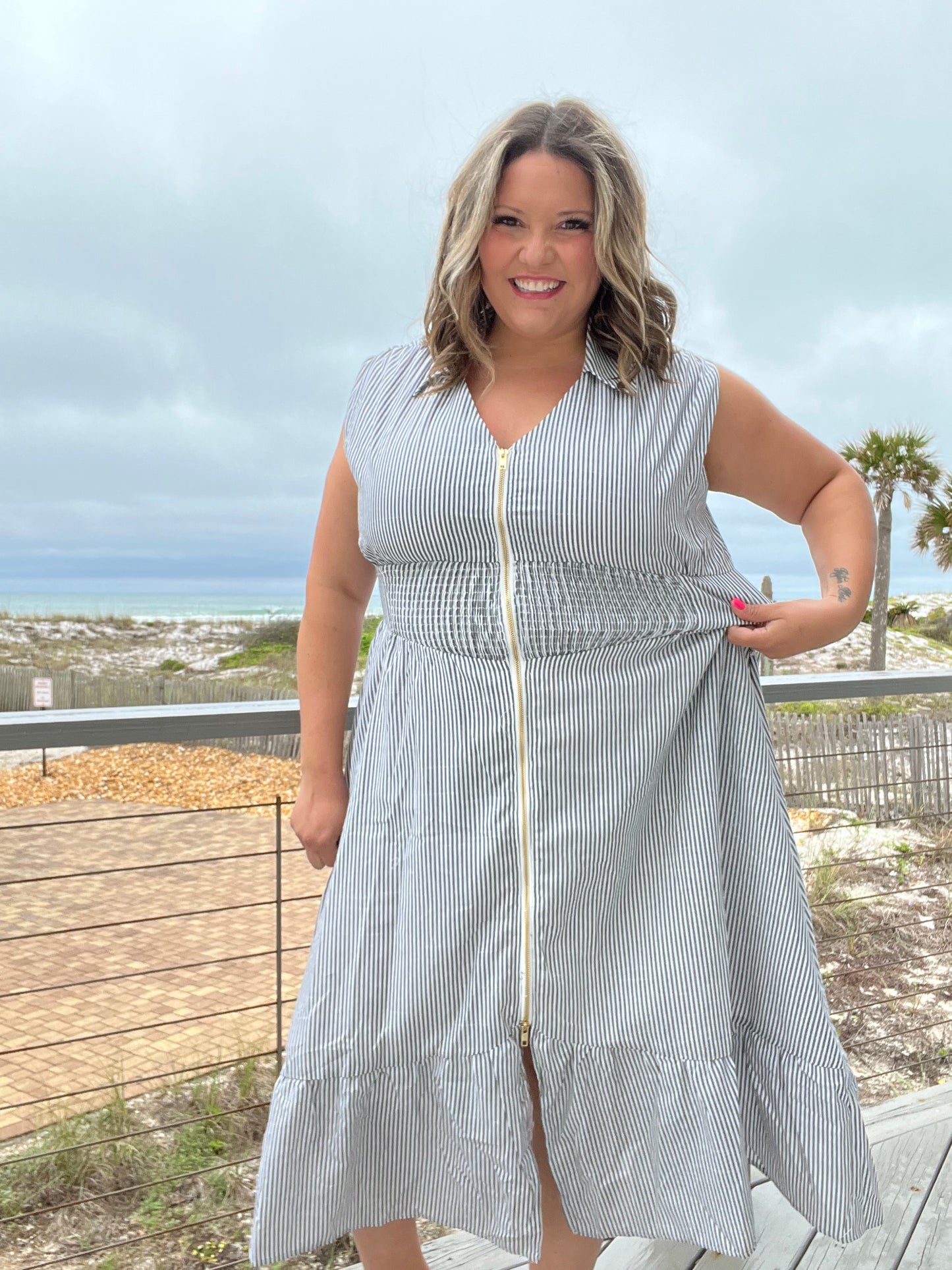 "Momentum" Sleeveless Zip Front Striped Dress