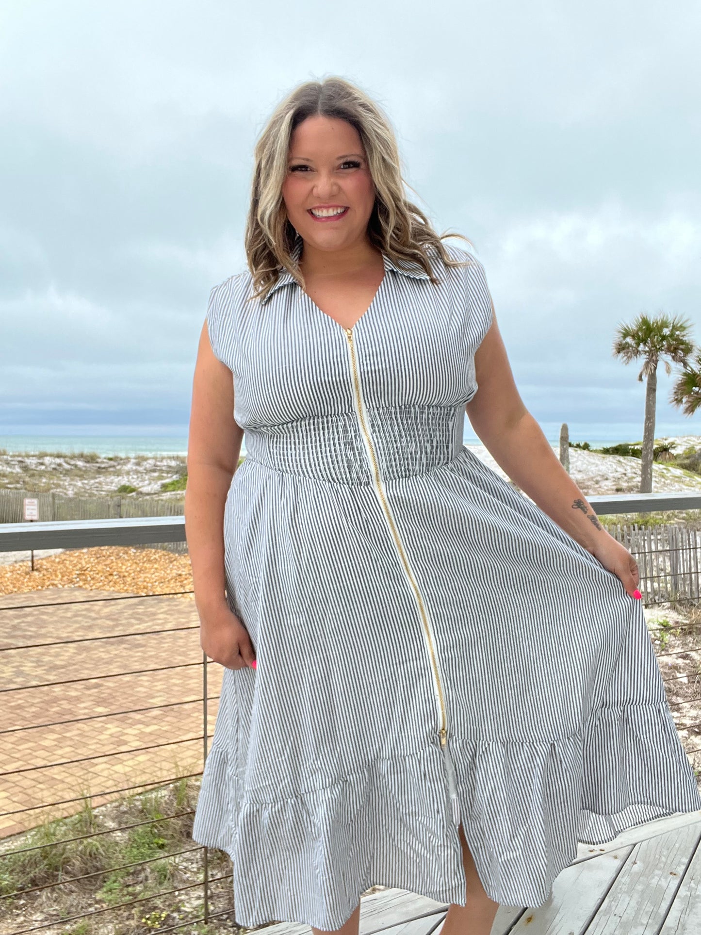 "Momentum" Sleeveless Zip Front Striped Dress