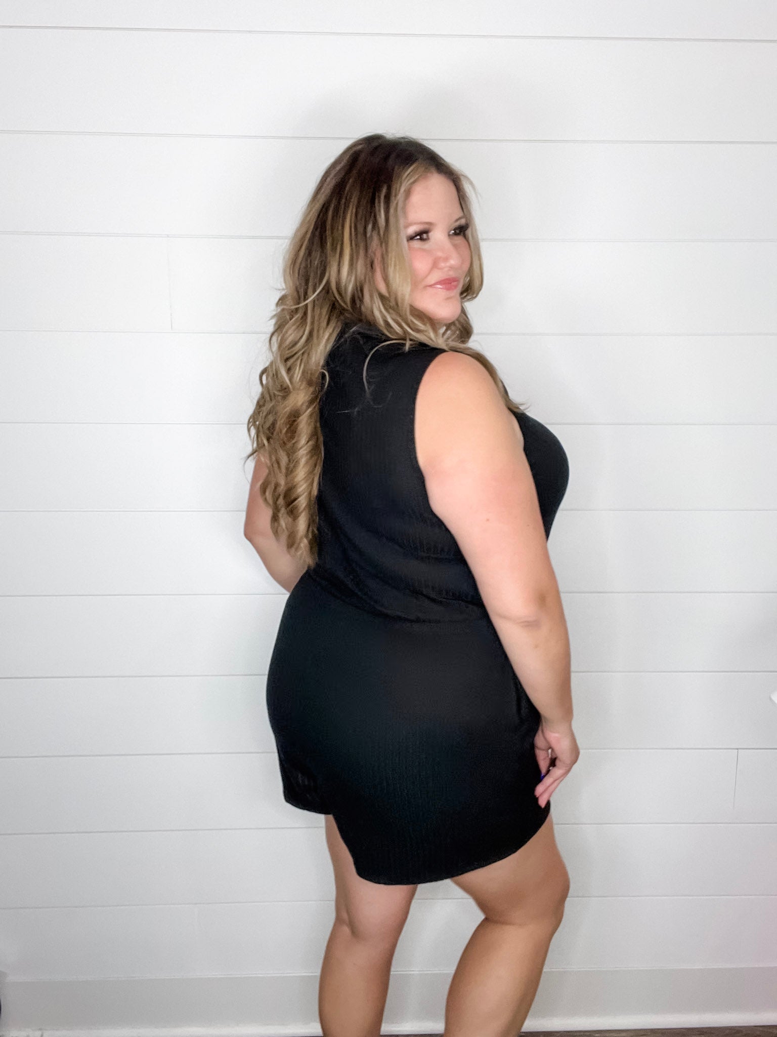 "Stream" Ruffle Wrap Front Romper (Black)