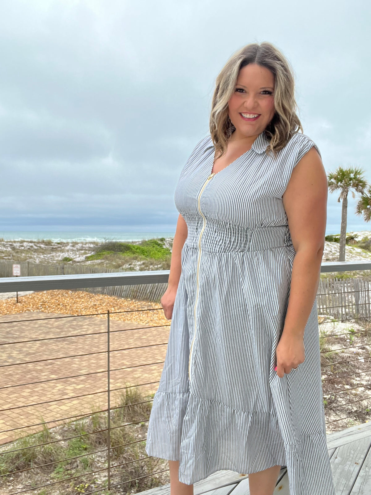 "Momentum" Sleeveless Zip Front Striped Dress