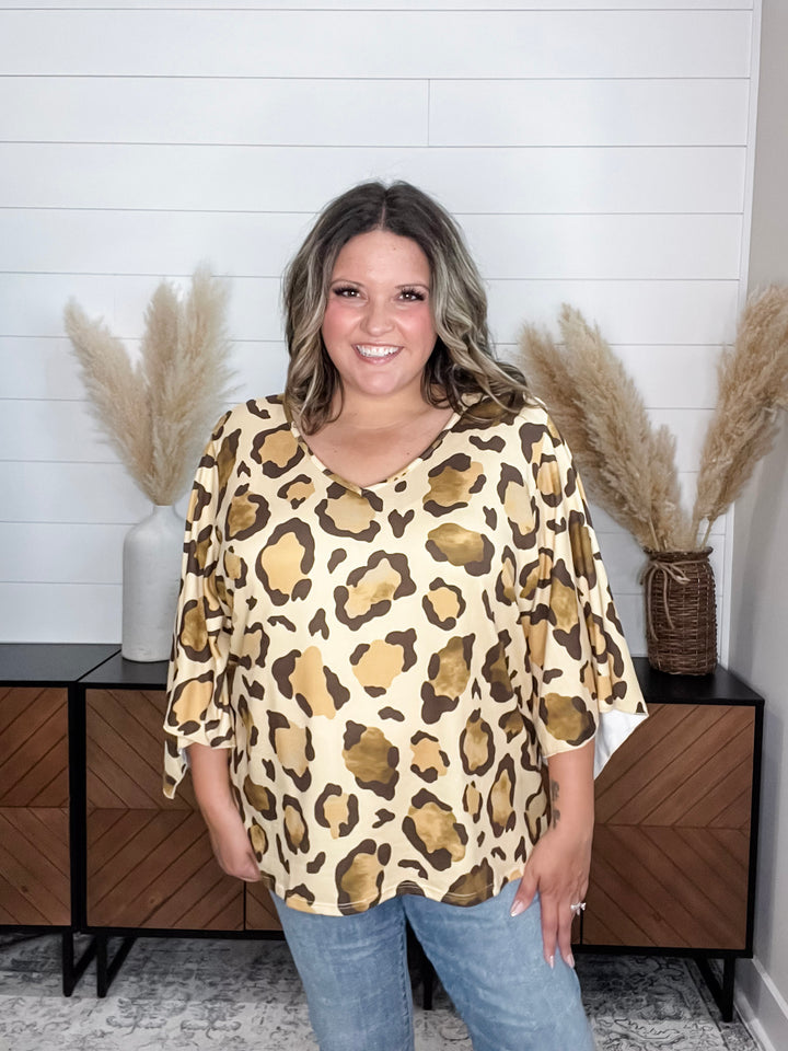 "Switch Up" Animal Print V Neck Tulip Sleeve
