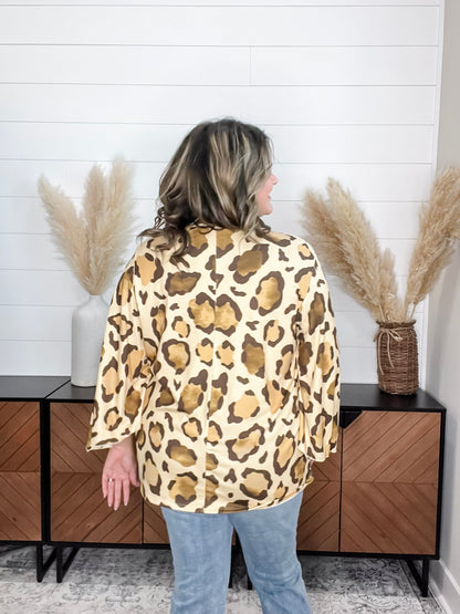 "Switch Up" Animal Print V Neck Tulip Sleeve