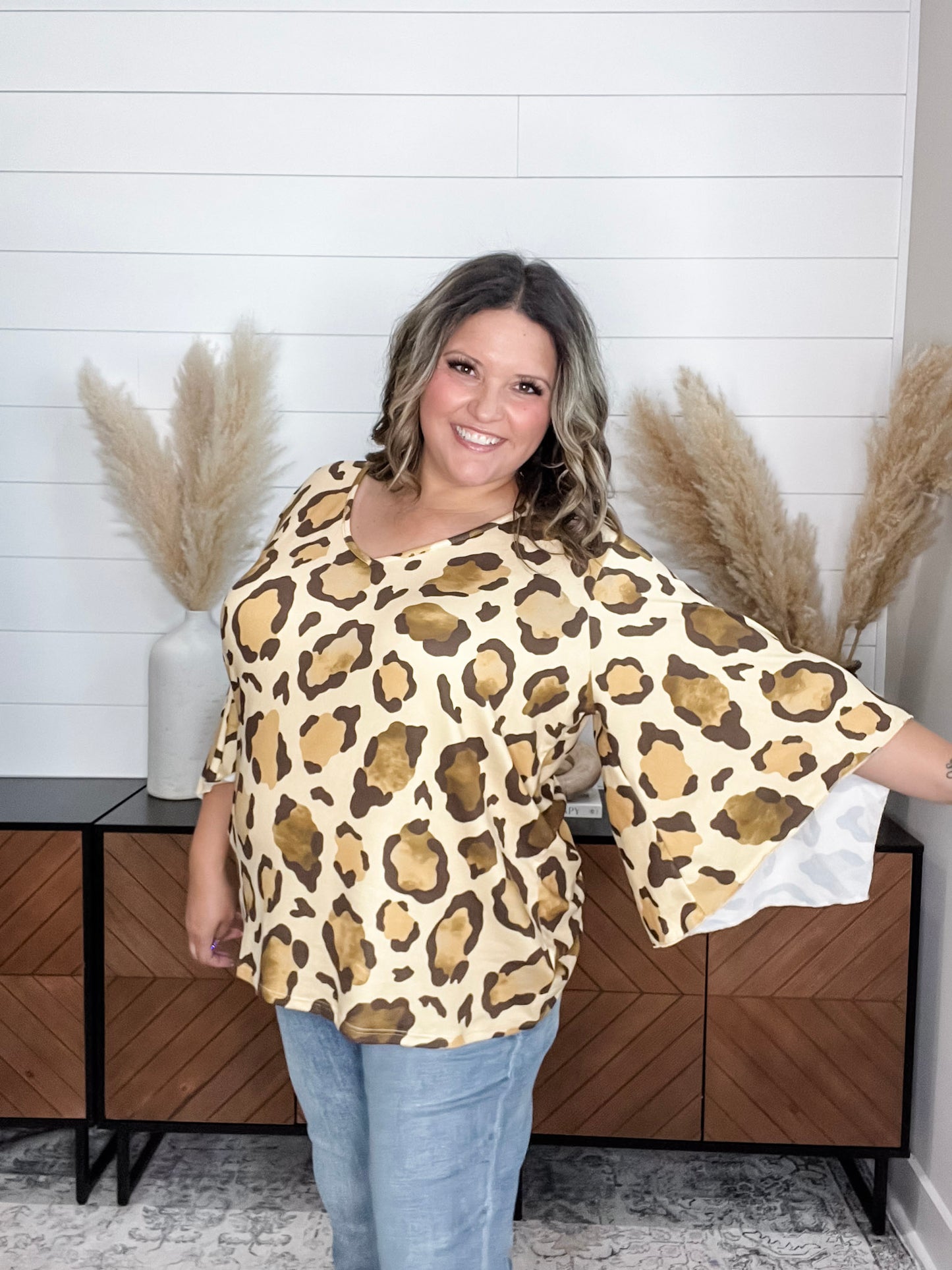 "Switch Up" Animal Print V Neck Tulip Sleeve