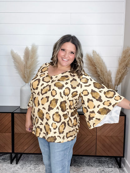 "Switch Up" Animal Print V Neck Tulip Sleeve