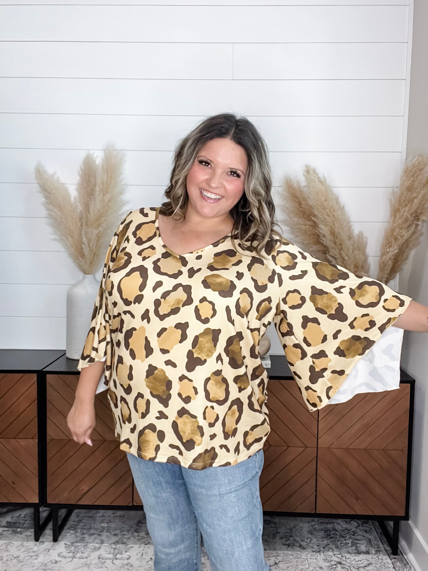 "Switch Up" Animal Print V Neck Tulip Sleeve
