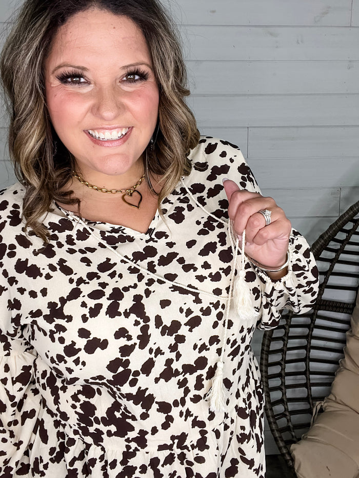 "Pasture" Animal Print Bubble Long Sleeve Peplum Top
