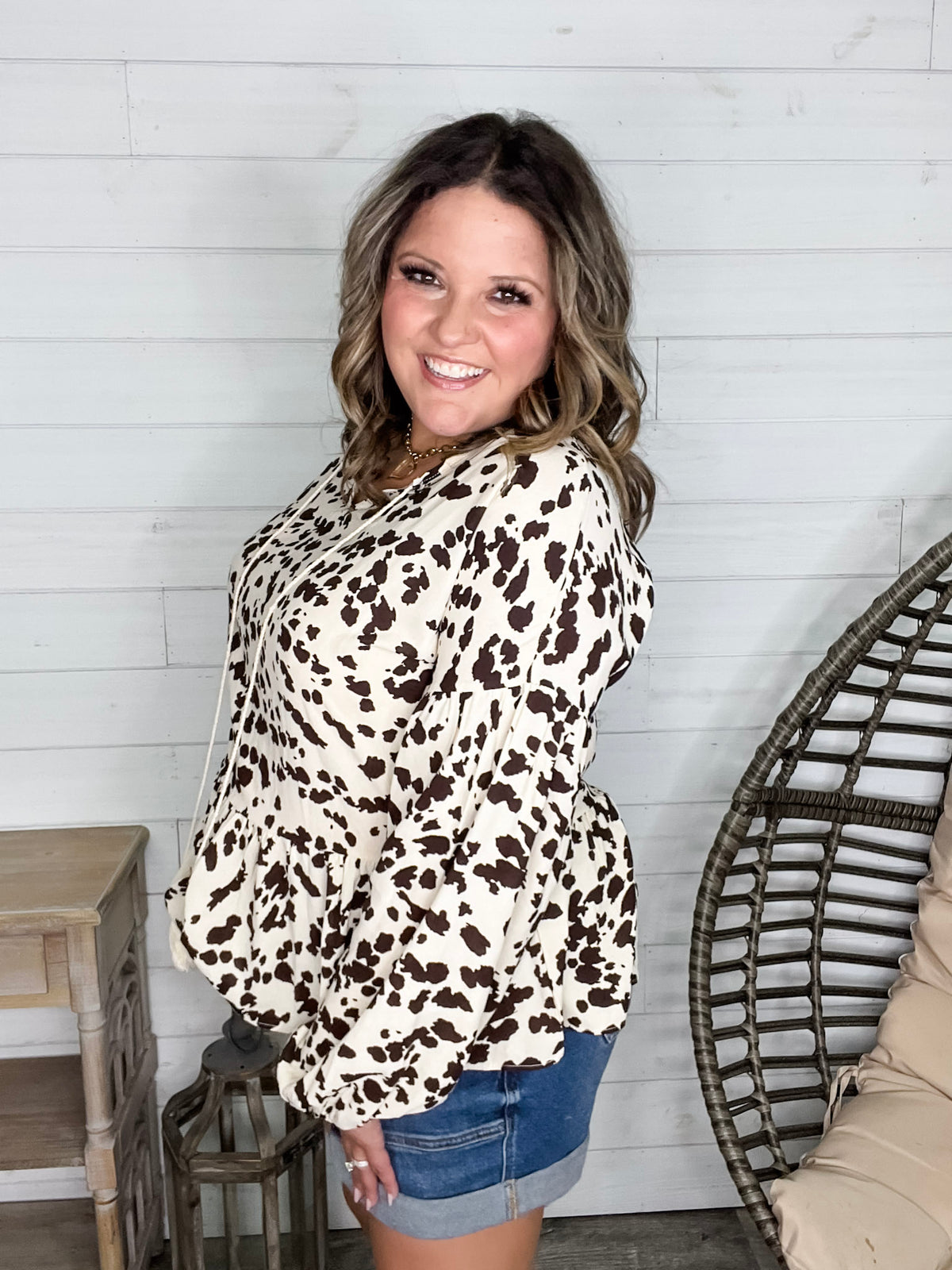 "Pasture" Animal Print Bubble Long Sleeve Peplum Top
