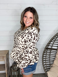 "Pasture" Animal Print Bubble Long Sleeve Peplum Top