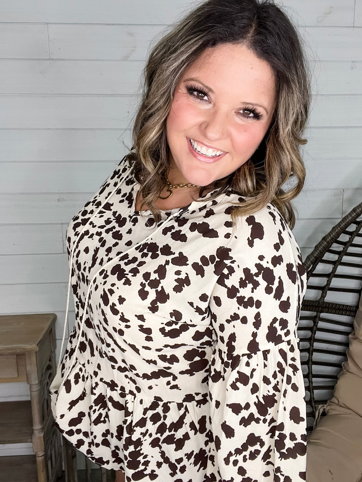 "Pasture" Animal Print Bubble Long Sleeve Peplum Top