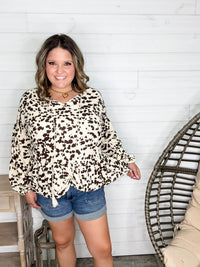 "Pasture" Animal Print Bubble Long Sleeve Peplum Top