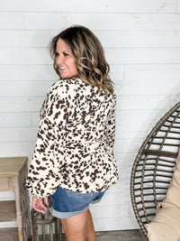 "Pasture" Animal Print Bubble Long Sleeve Peplum Top