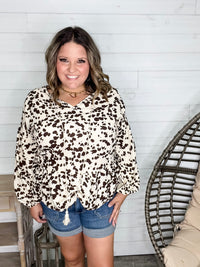 "Pasture" Animal Print Bubble Long Sleeve Peplum Top