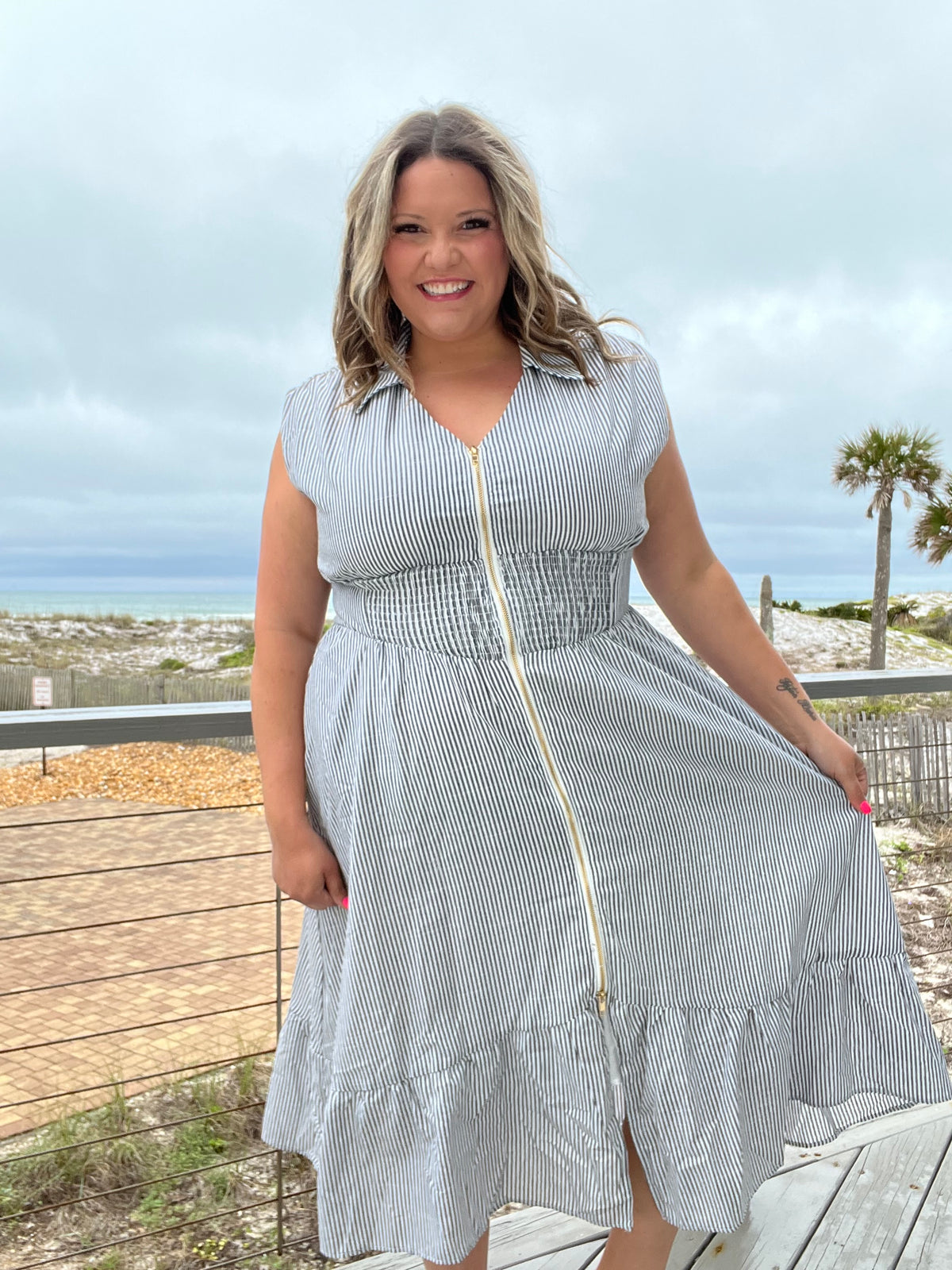 "Momentum" Sleeveless Zip Front Striped Dress