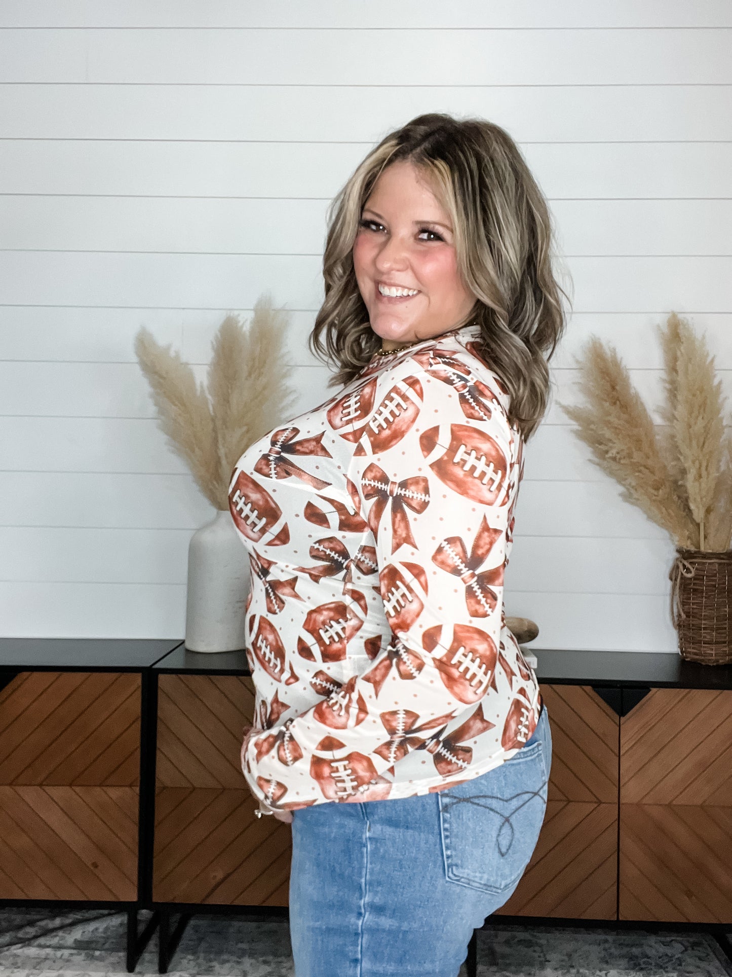 Shirley and Stone Footballs & Bows Long Sleeve Mesh Top