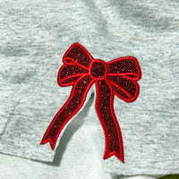 JOCOink sweatshirt with side bows, raw-cut hem and side slits, glitter appliqué | Lola Monroe Boutique