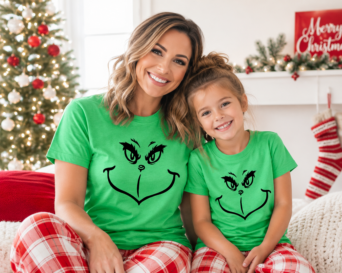 JOCOink He’s a mean one face - DTF printed on gildan Irish green | Lola Monroe Boutique