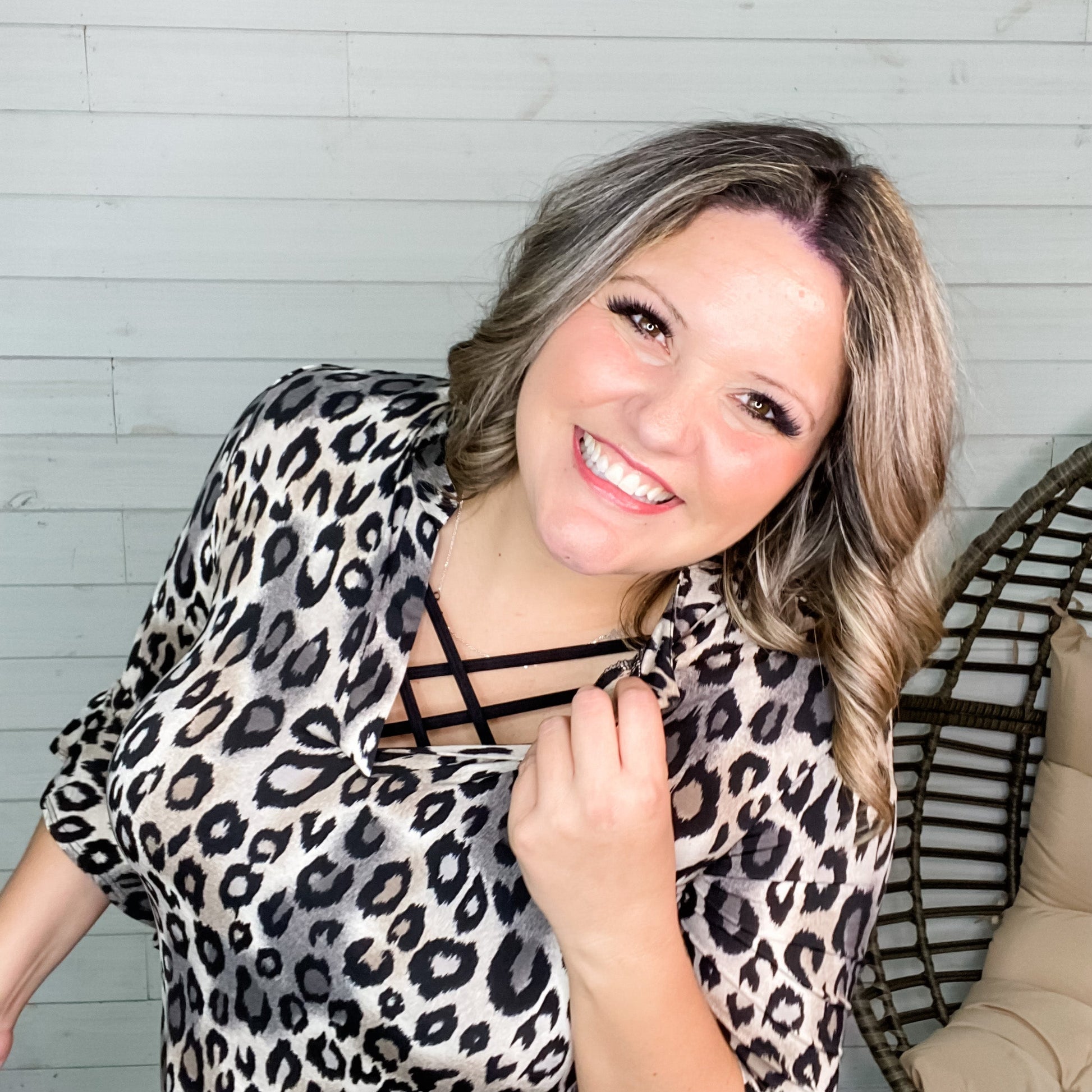 "Amara" Animal Print 3/4 Ruffle Sleeve Split Neck