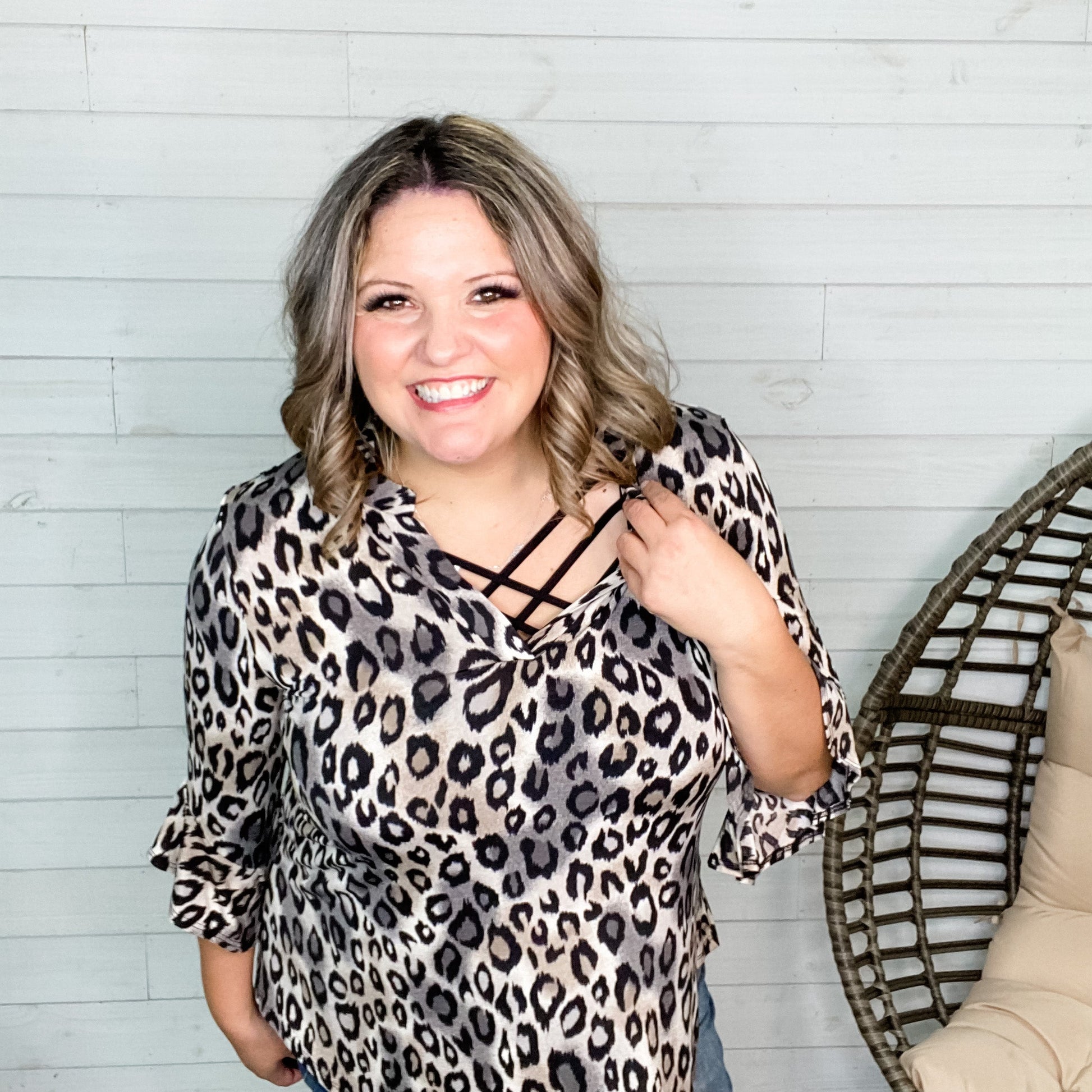 "Amara" Animal Print 3/4 Ruffle Sleeve Split Neck