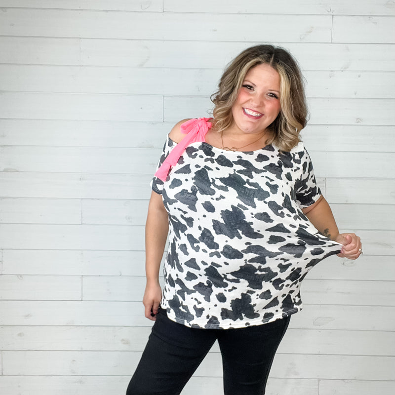 "Roaming" Short Sleeve Cow Print with Pink Bow