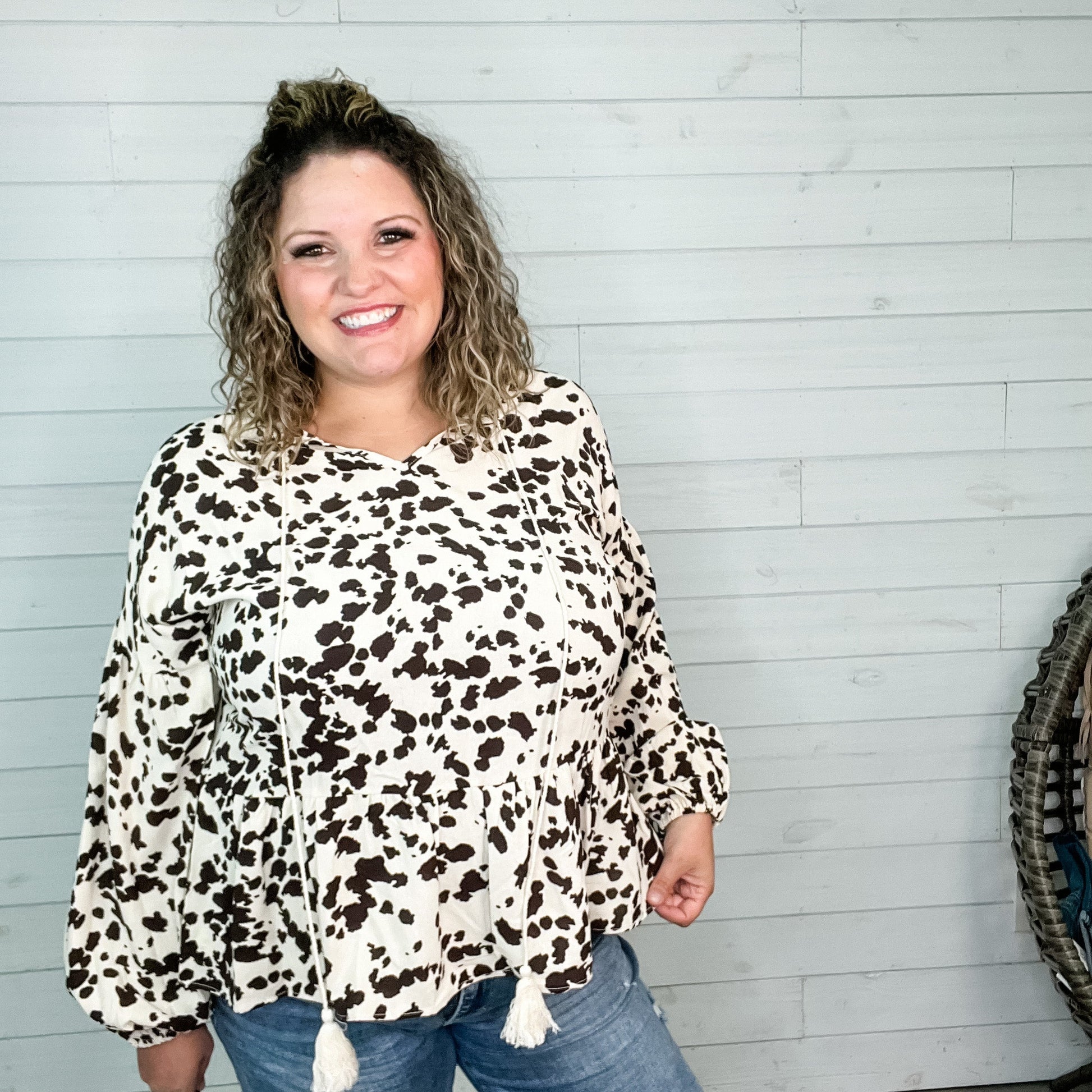 "Pasture" Animal Print Bubble Long Sleeve Peplum Top