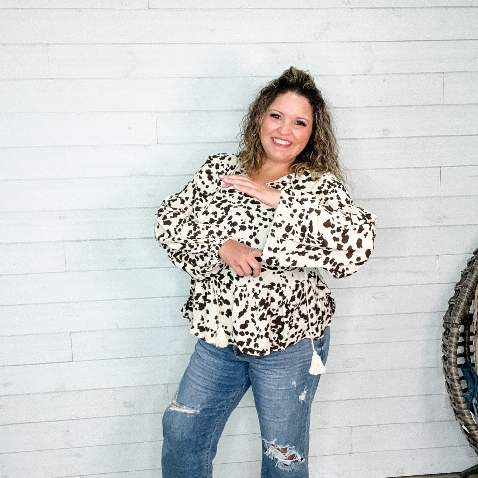 "Pasture" Animal Print Bubble Long Sleeve Peplum Top