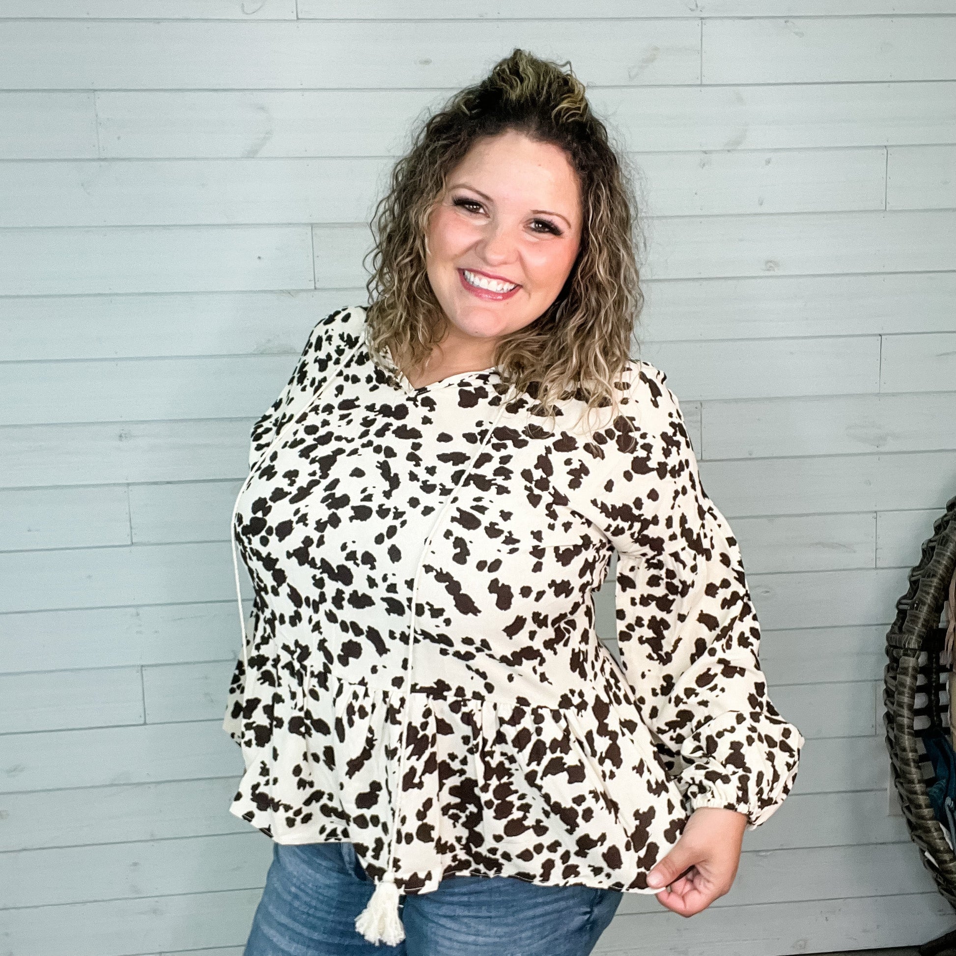 "Pasture" Animal Print Bubble Long Sleeve Peplum Top