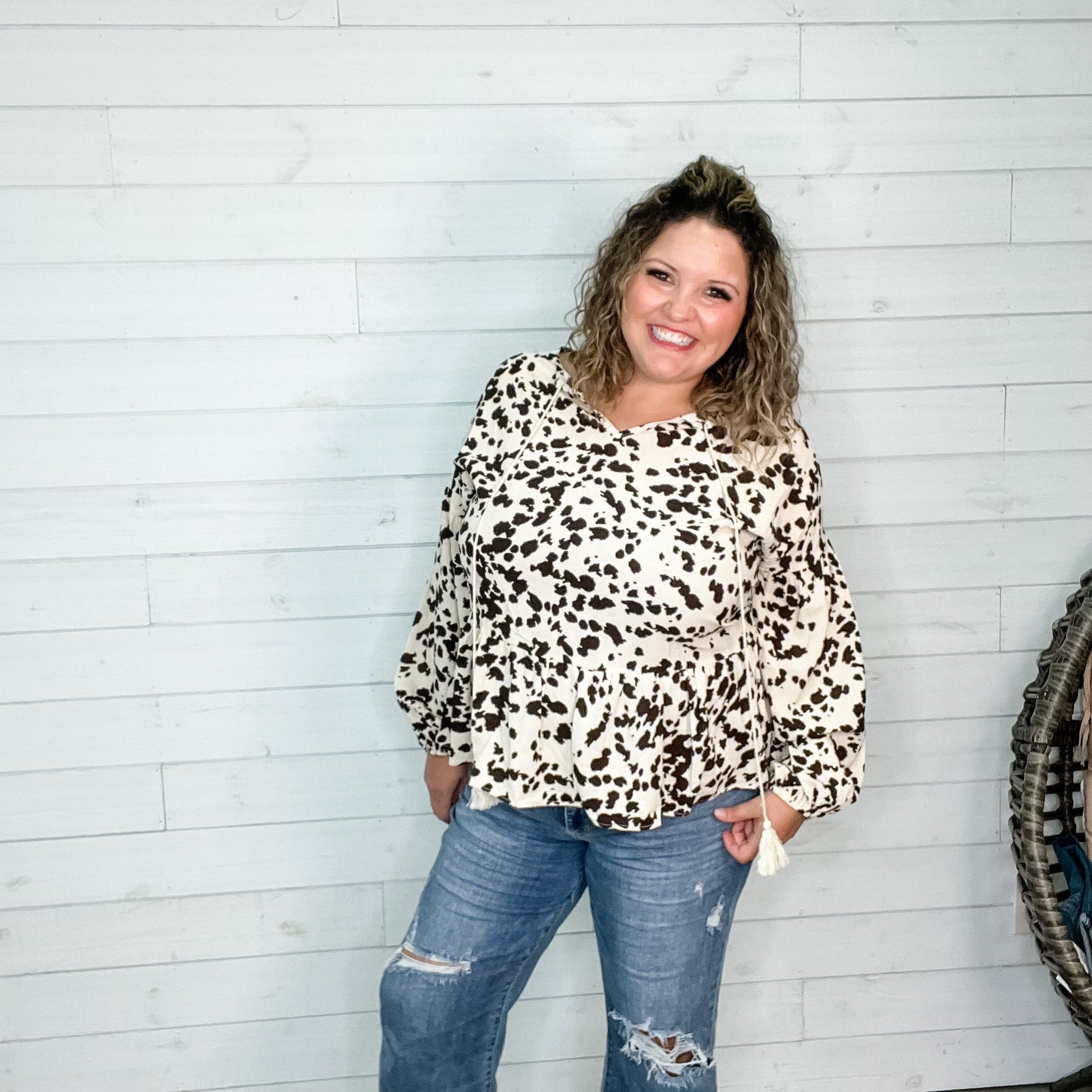 "Pasture" Animal Print Bubble Long Sleeve Peplum Top