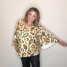 "Switch Up" Animal Print V Neck Tulip Sleeve-Lola Monroe Boutique