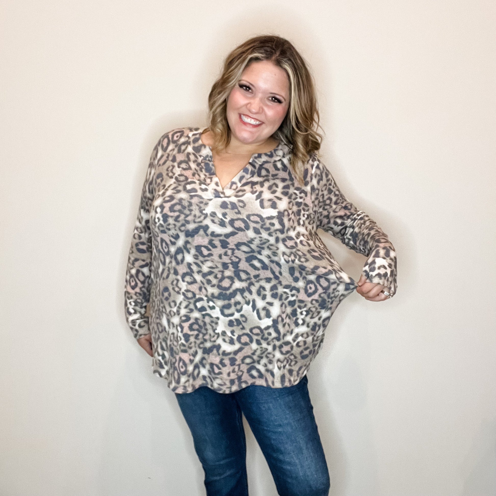 "Whiplash" Animal Print Long Sleeve Split Neck