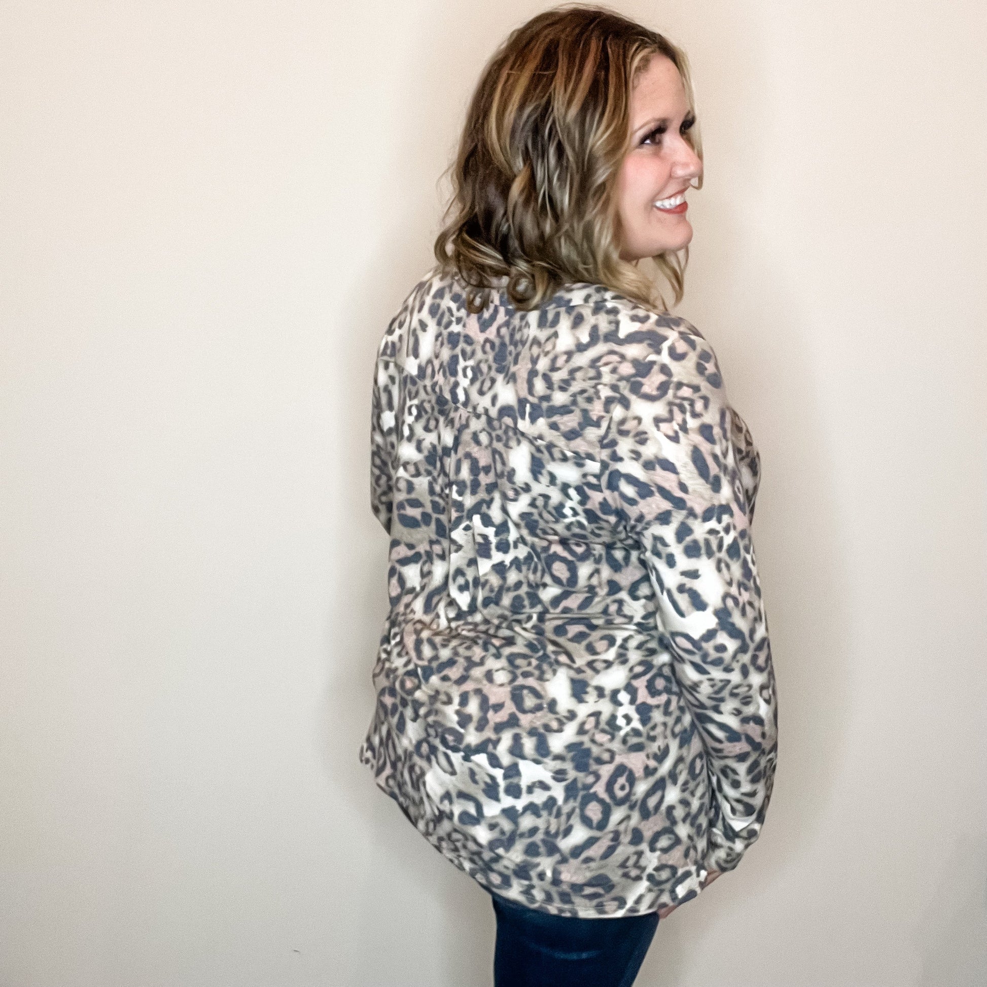 "Whiplash" Animal Print Long Sleeve Split Neck