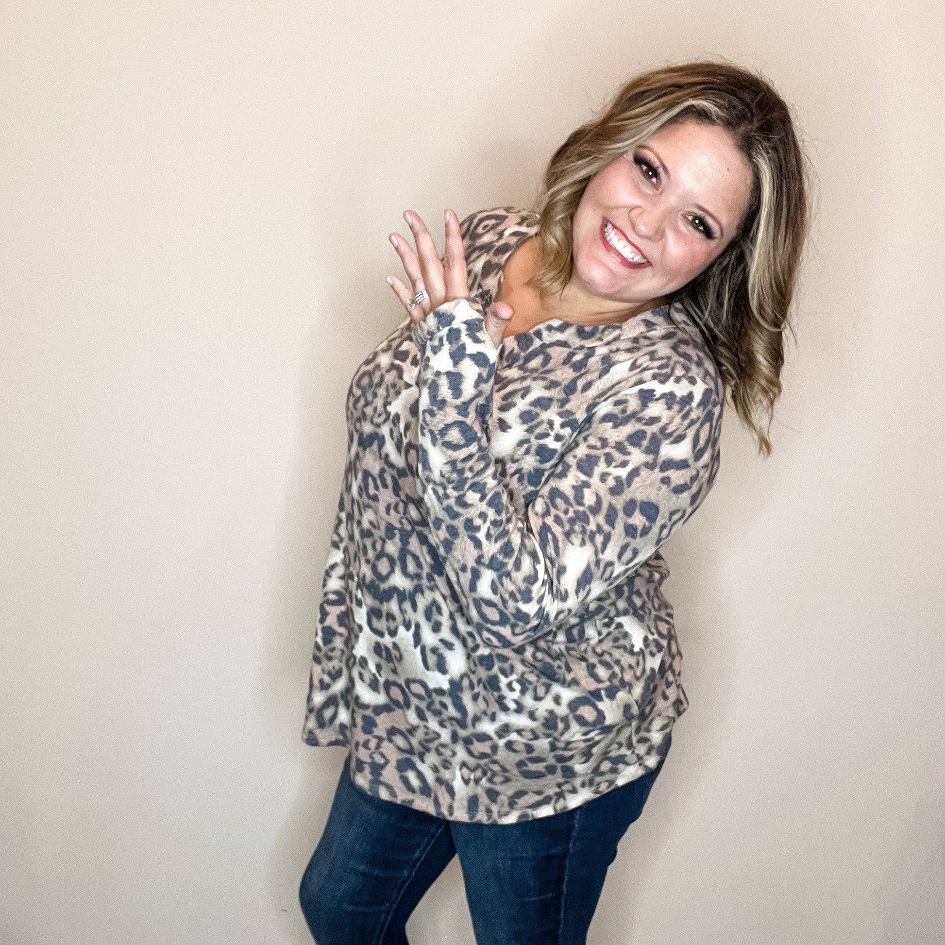 "Whiplash" Animal Print Long Sleeve Split Neck
